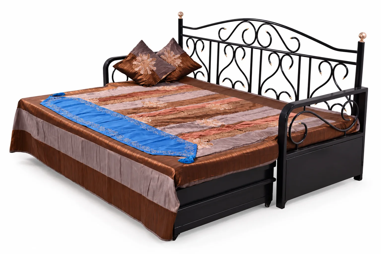 Wrought iron diwan that opens out into a bed.
