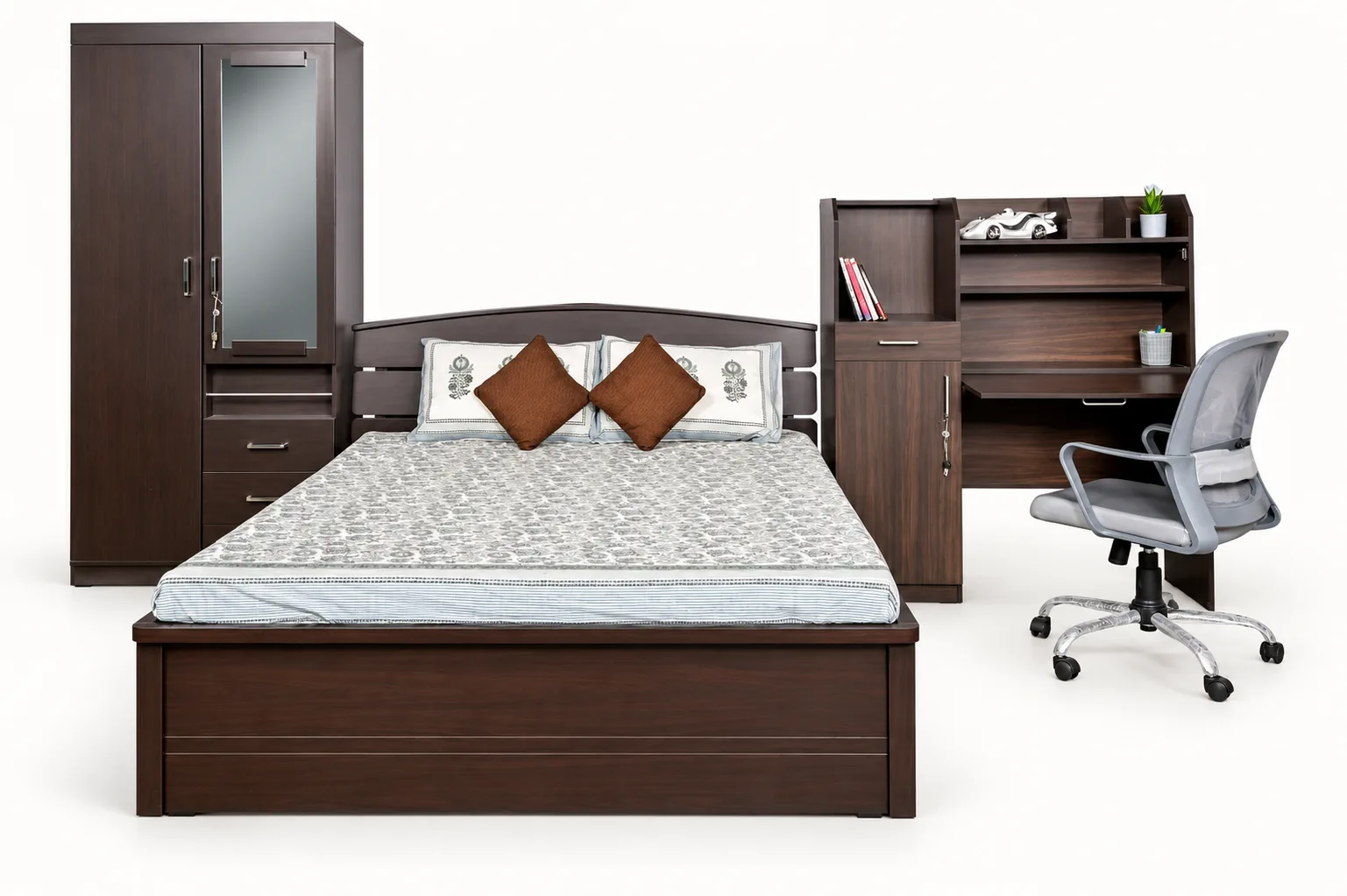 A full bedroom: bed, wardrobe, dressing table and chair.