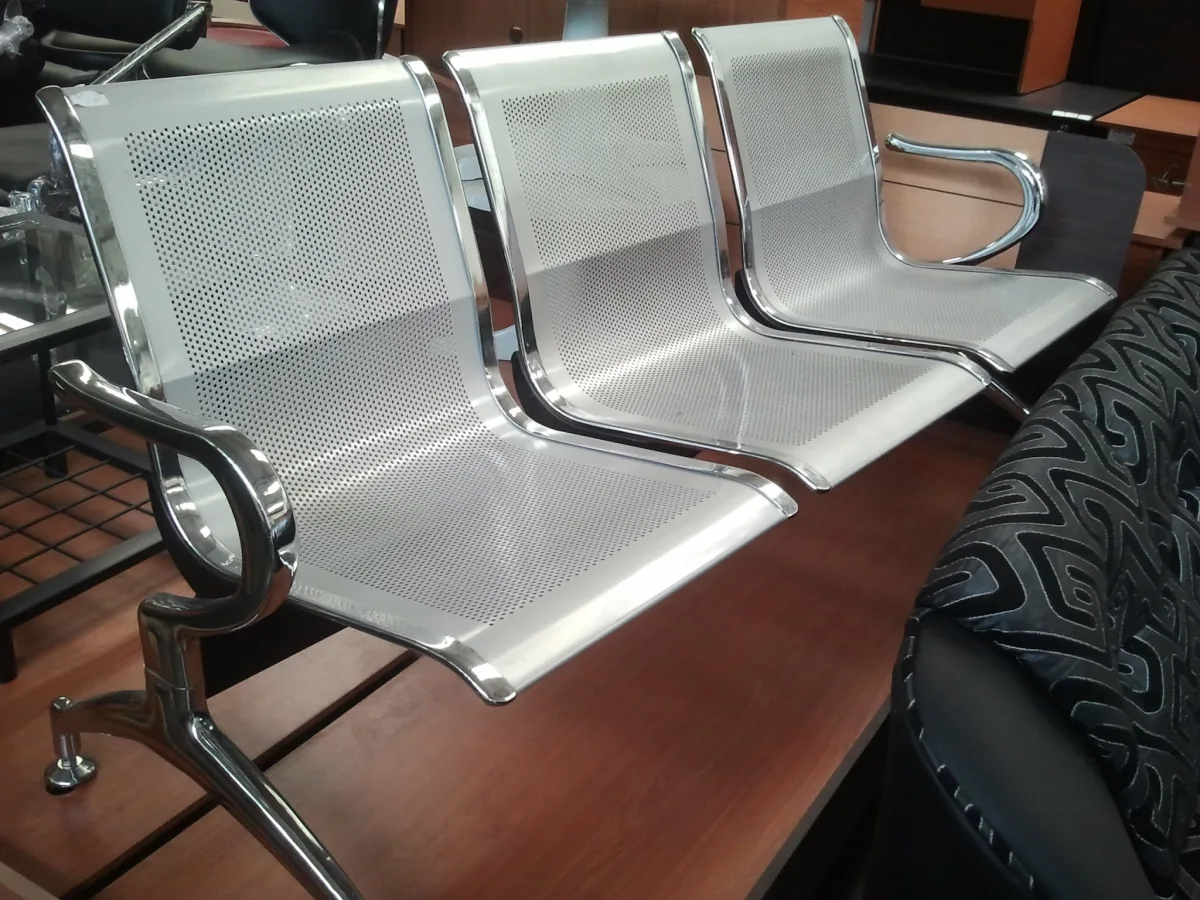 Three seater steel bench seating for waiting areas.