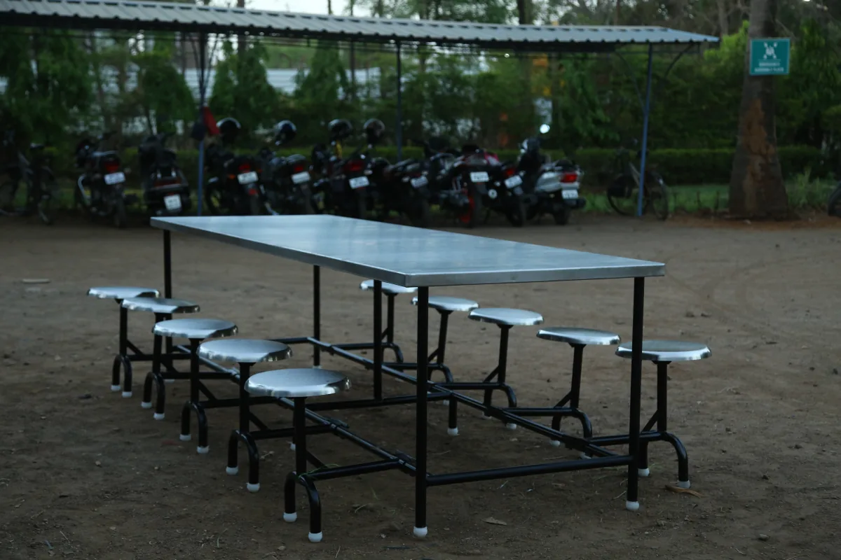 Canteen table with attached stools.