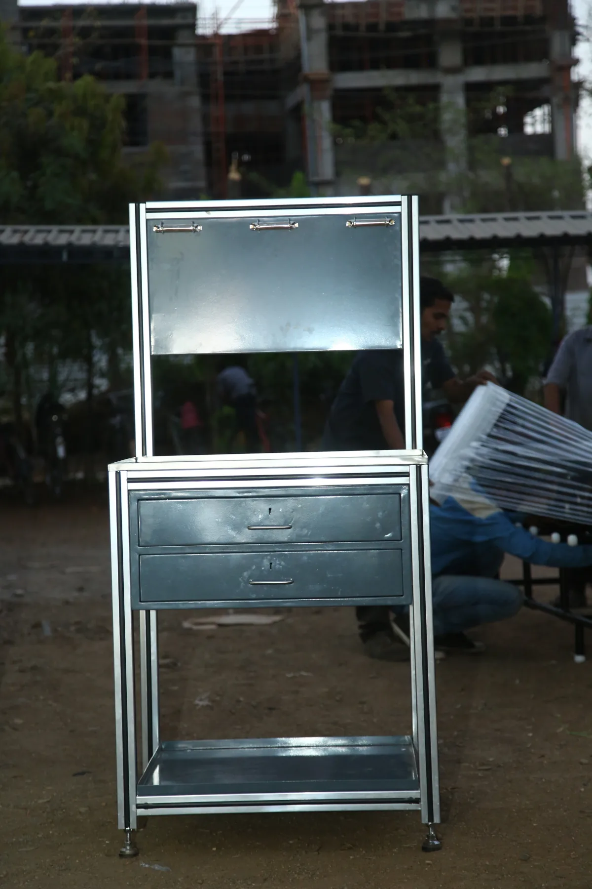 Folding stainless steel stand.