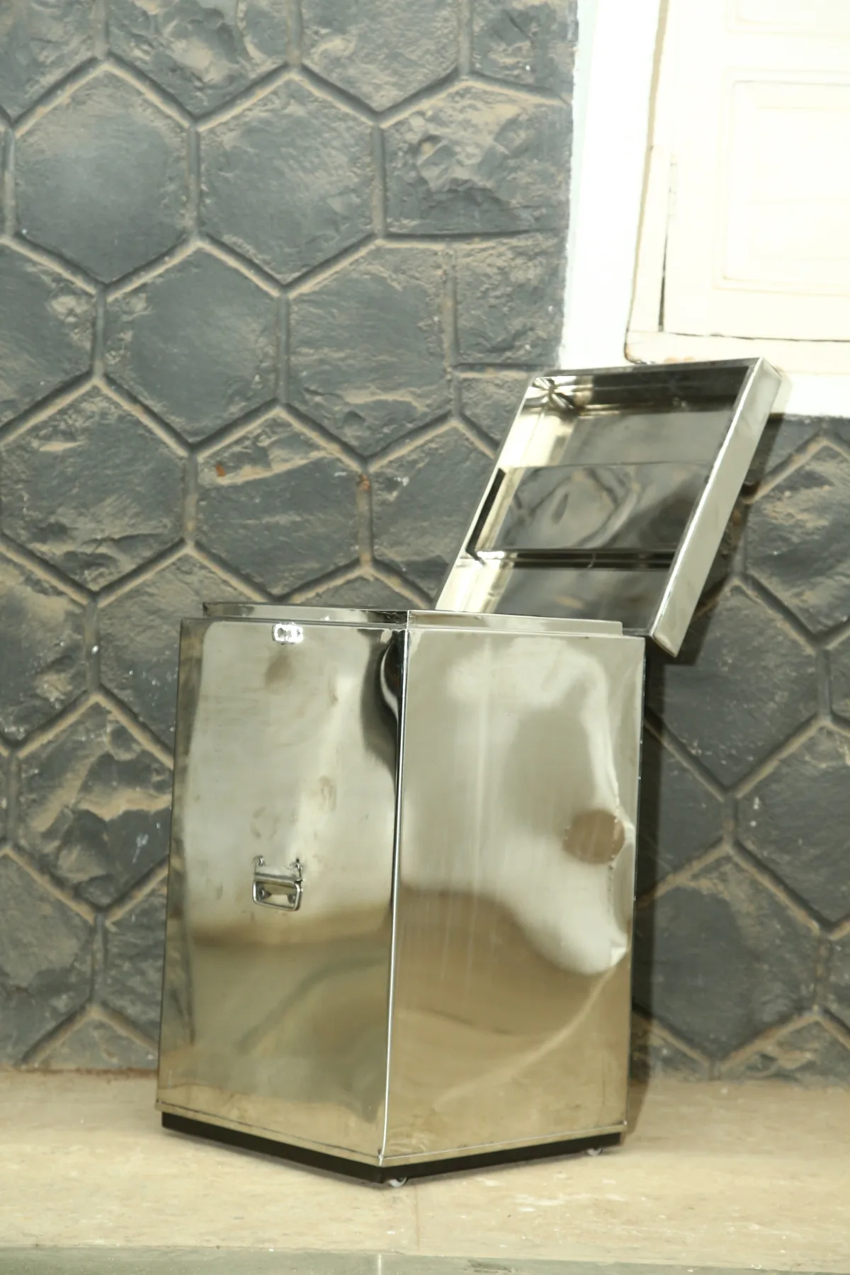 Stainless steel bin.