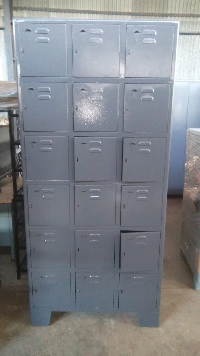Eighteen door steel locker for factories and staff rooms.