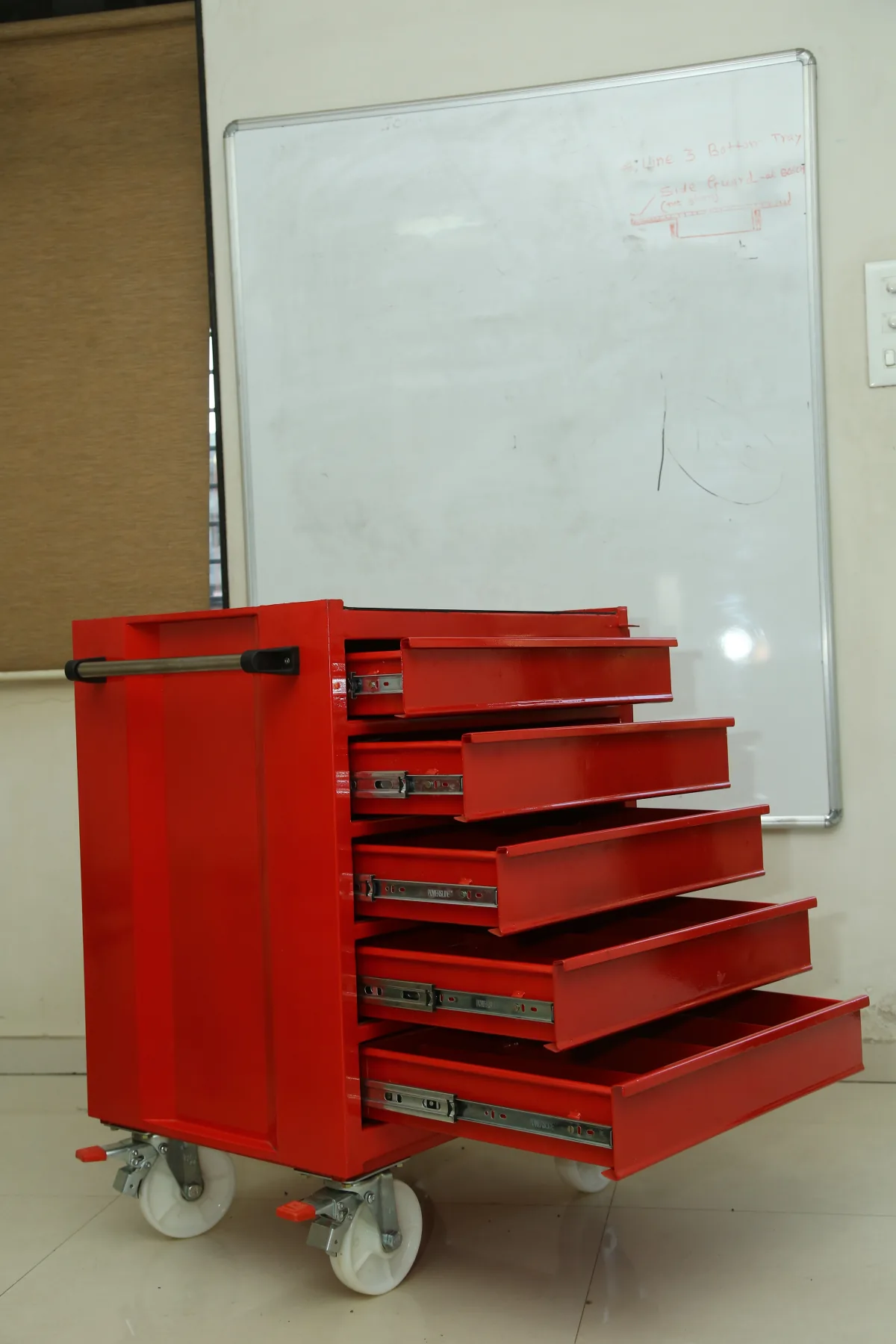 Seven drawer tool trolley on castors.