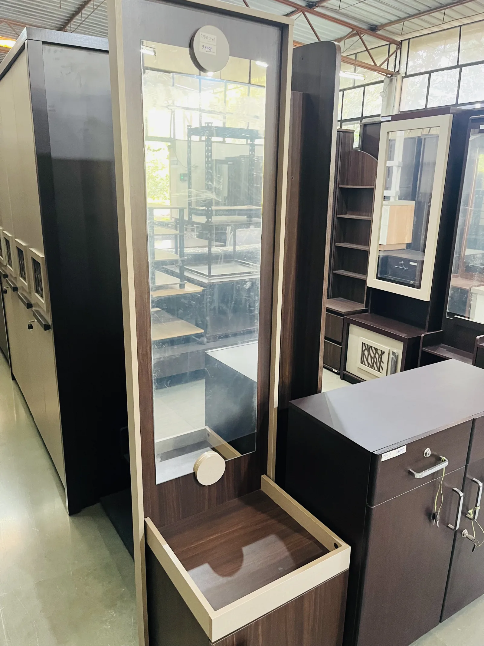 Wardrobes and dressing units on display.
